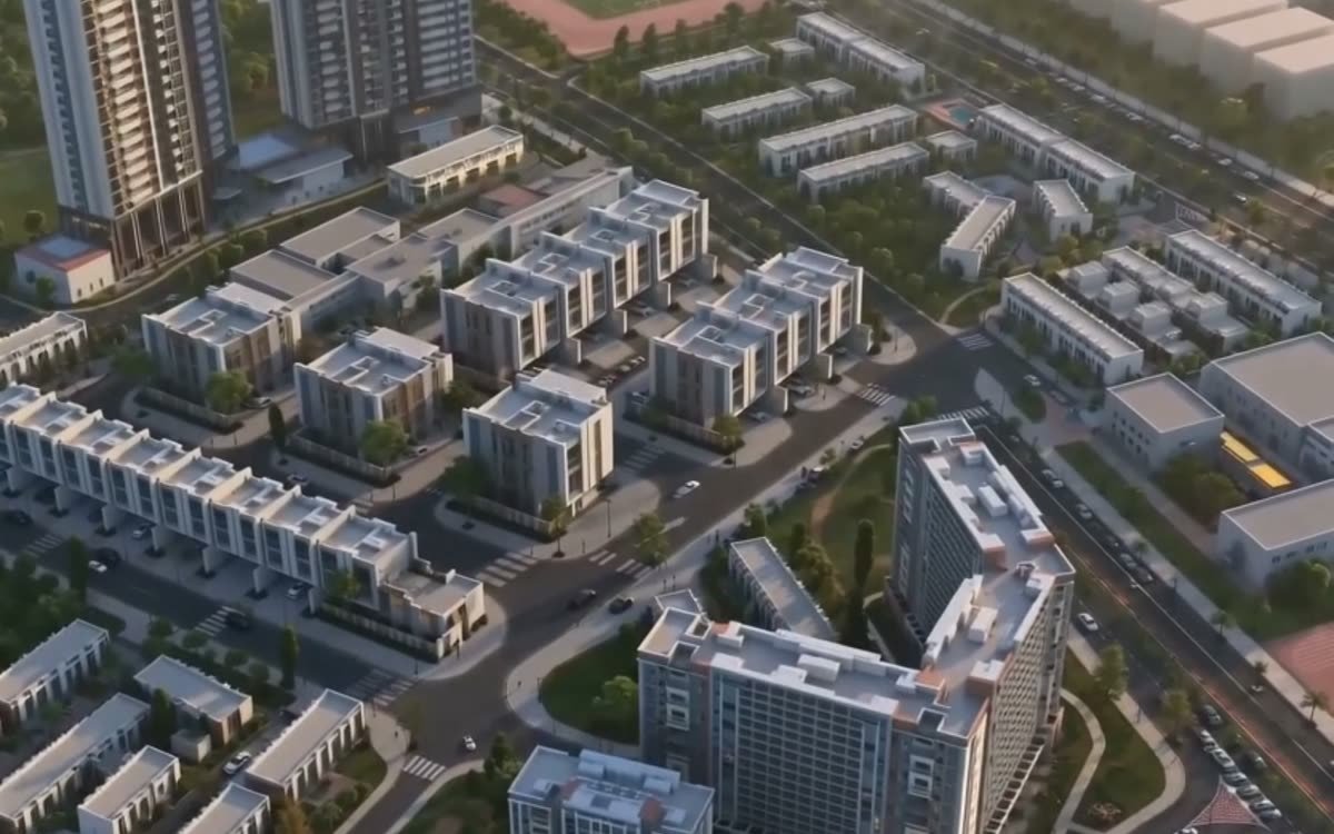 Verdana — townhouses and apartment buildings in Dubai Investments Park seen from the air